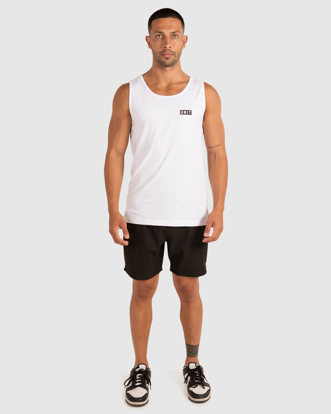 MENS SINGLETS - CASE