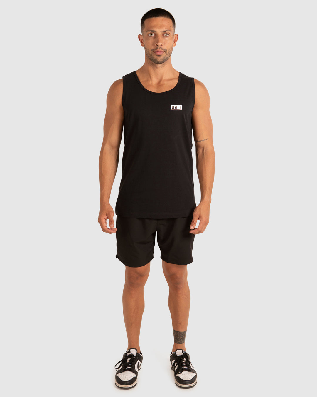 MENS SINGLETS - CASE