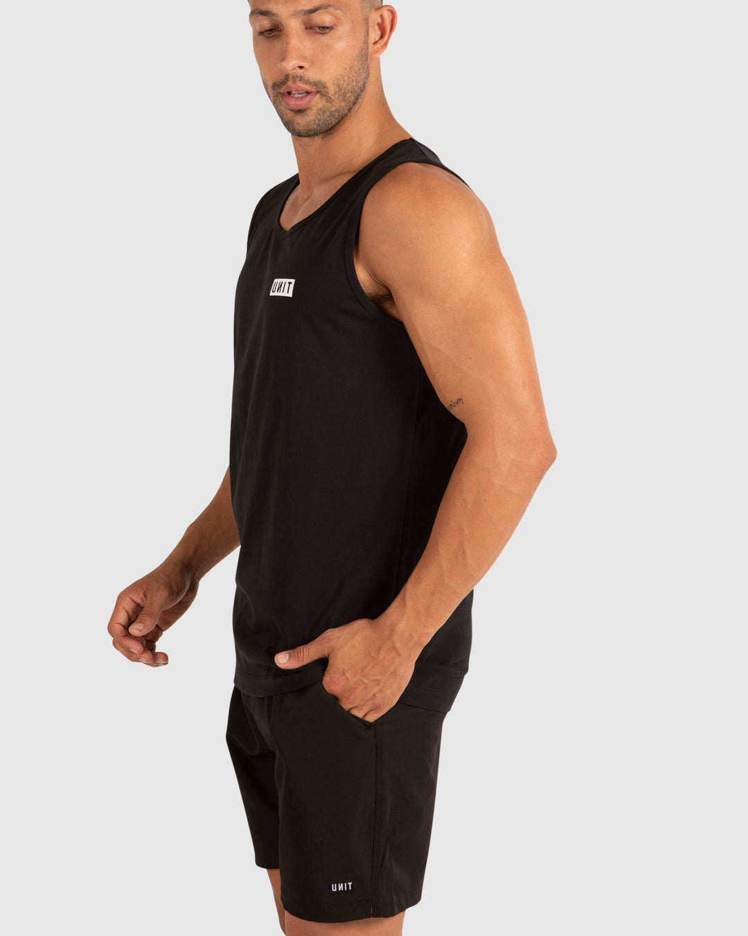 MENS SINGLETS - CASE